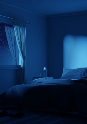 A dark peaceful bedroom at night with stars